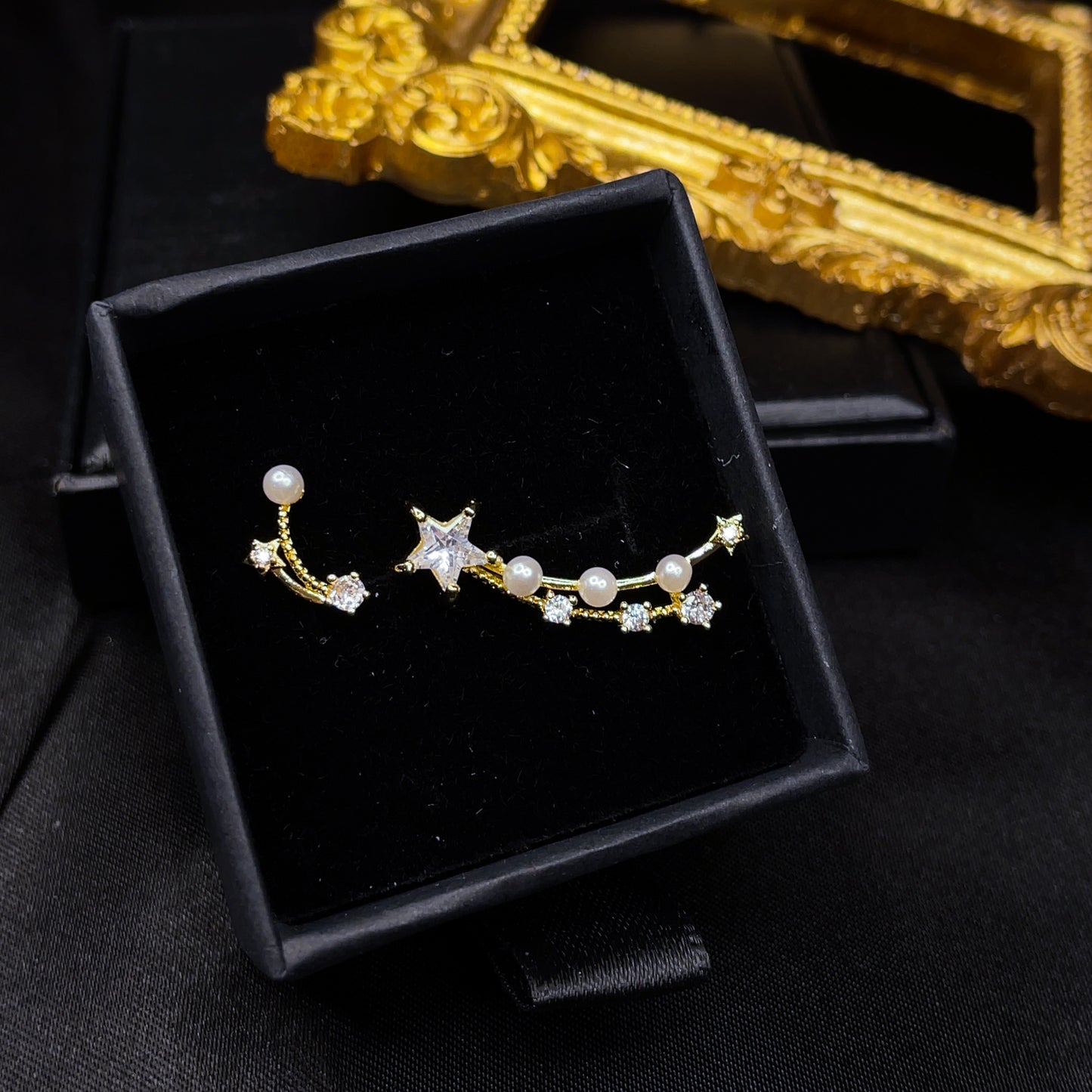 Mismatched Shooting Star Studs